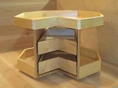 2 drawer rotating cookware storage module for corner cabinets. Clear finish. Dovetailed drawers 